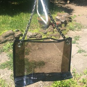 Slightly dark tinted clear tote bag with silver.